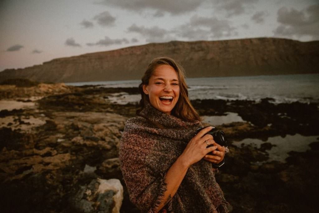Wedding photographer Meral Soydas smiling and holding a camera