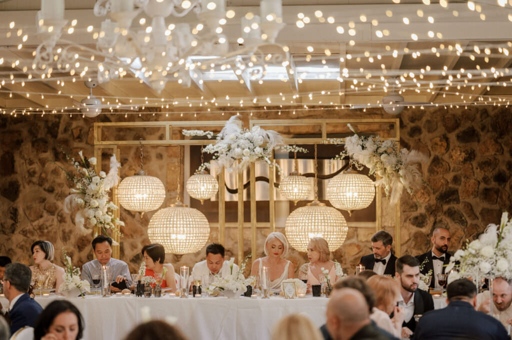 Wedding couple and familie at the head table during their wedding on tenerife