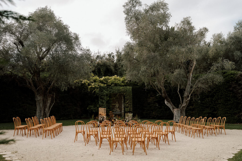 wedding ceremony set up with mirror arch for outdoor ceremony at bastide du roy