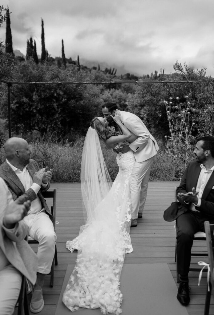couple doing a dip kiss after the ceremony. Spain wedding photographer